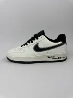 Embossed Monogram Low-Top Sneakers - Image 2