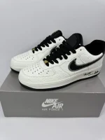 Embossed Monogram Low-Top Sneakers - Image 5