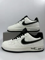 Embossed Monogram Low-Top Sneakers - Image 4