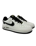 Embossed Monogram Low-Top Sneakers