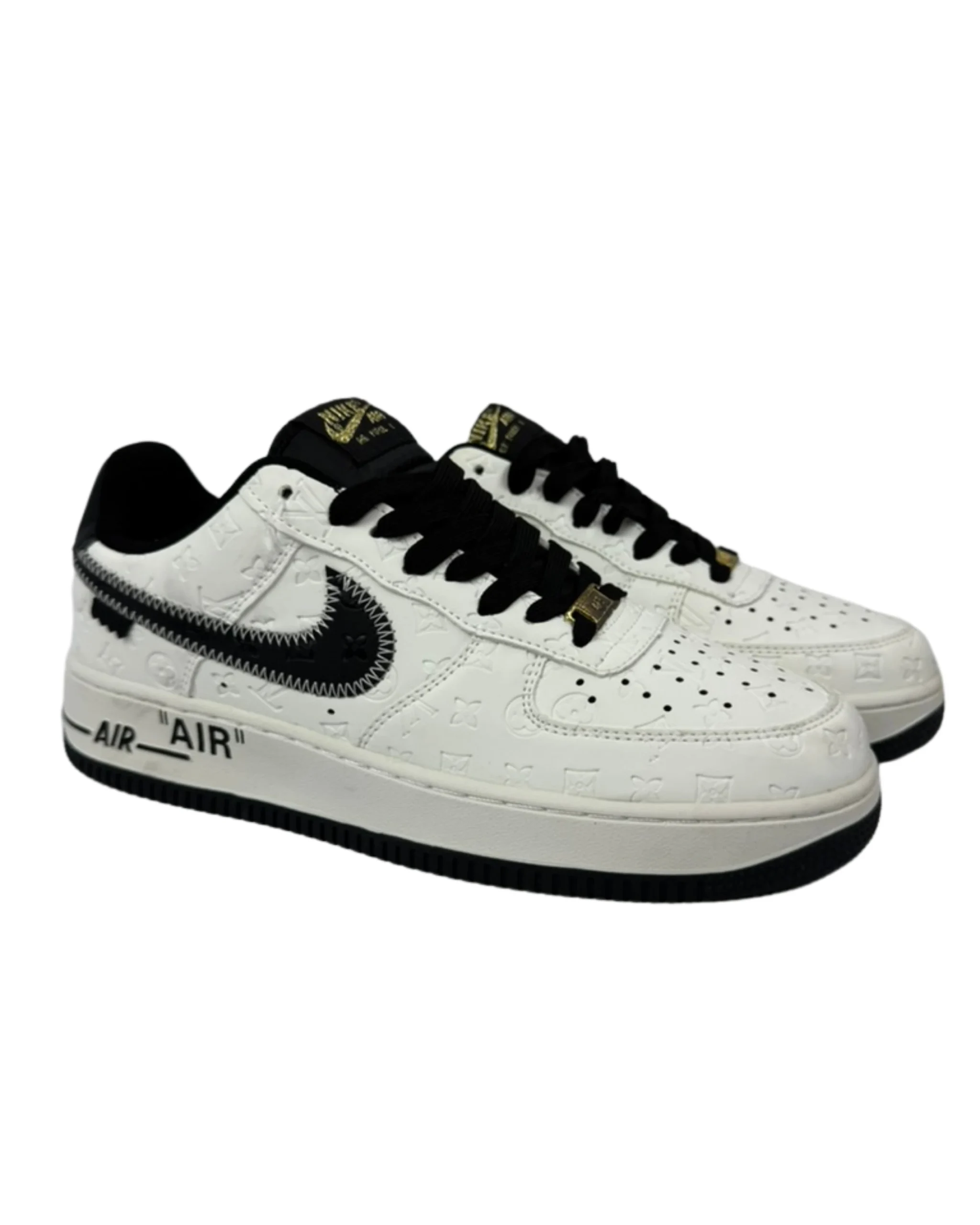 Shoe 22.1 Embossed Monogram Low-Top Sneakers - Image 1
