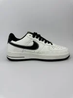 Embossed Monogram Low-Top Sneakers - Image 3
